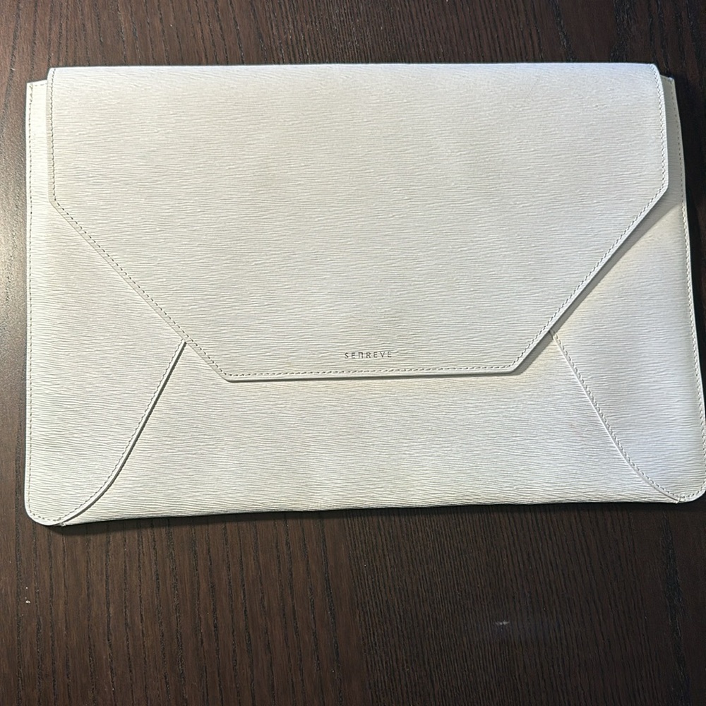 Senreve white vegan leather clutch.